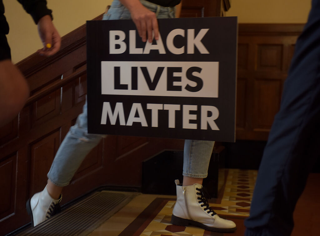 Students march up to the second floor of Jesse Hall